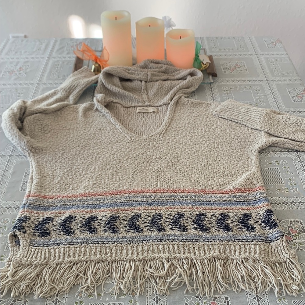 Cozy Beige Knit Sweater with Fringe